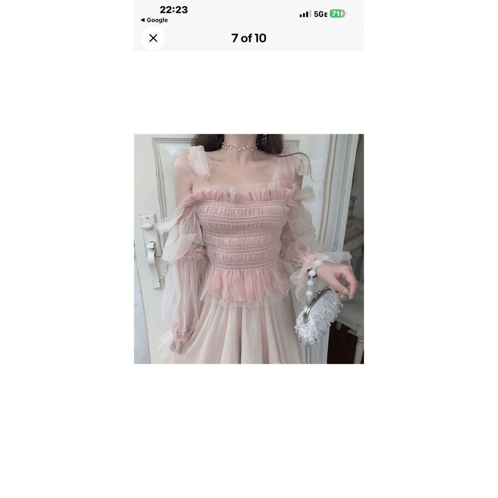 Beulah tulle organza ruffle blouse featuring a sheer, off-the-shoulder whimsical